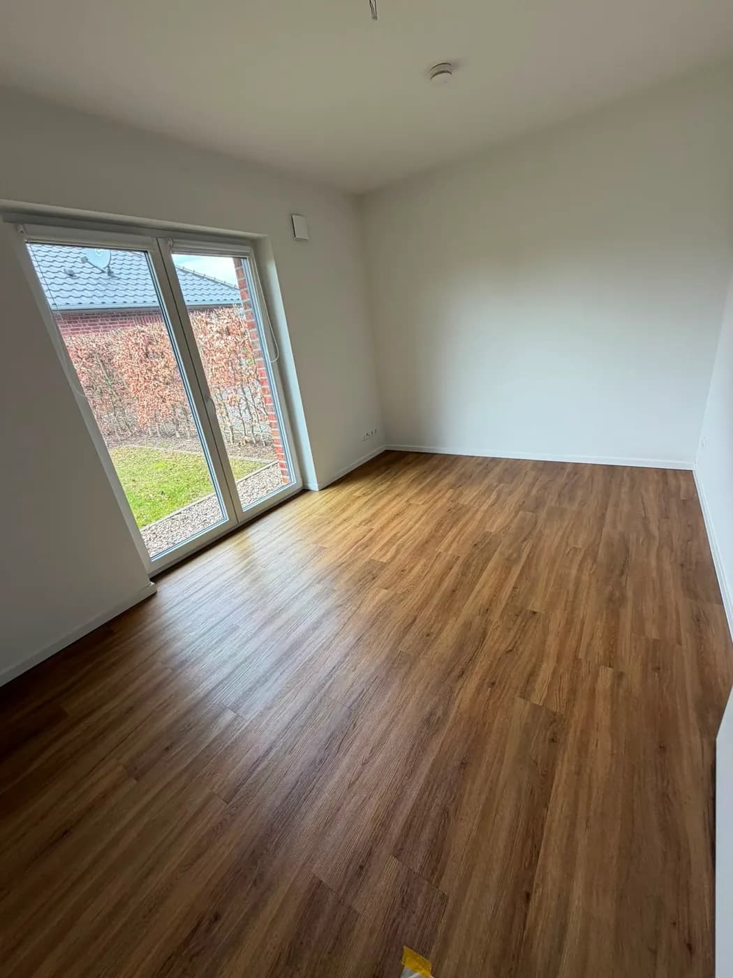 Zimmer mit neuem Holzboden